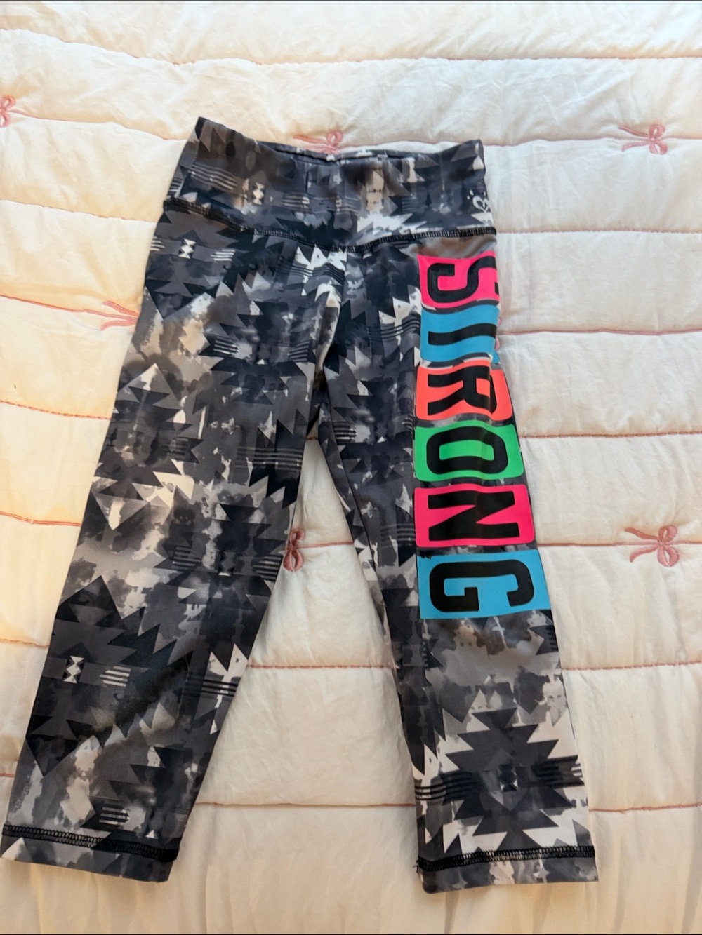 Justice Gray Black Geometric Leggings with Neon 'STRONG' Side Panels